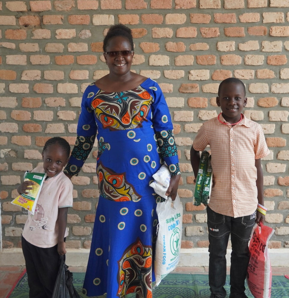 Add a gift to support women empowerment programs and youth education in Uganda